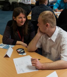 Financial Advocate Maddy working with person at workshop